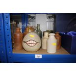 A quantity of stoneware bottles etc.