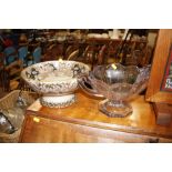 A porcelain bowl and a glass fruit bowl