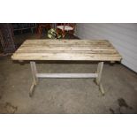 A wooden slated garden table