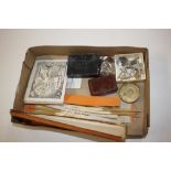 A box containing quill pens, watch, costume jewell