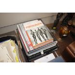 Four various Glamour Photography books, including Vanity Fai