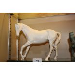 A Royal Doulton white glazed figure of a stallion