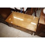 An oak and elm blanket box with plate glass top