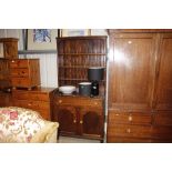 A 20th Century oak dresser raised on cupboard base