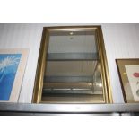 A gold framed mirror