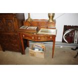 A yew wood writing desk