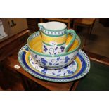 A floral decorated bowl, jug and platter