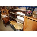 A stained pine open fronted bookcase