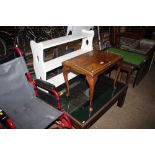 An illuminating glass topped coffee table; and a walnut side tab