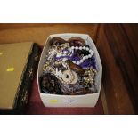 A box containing costume jewellery