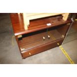 A reproduction TV stand