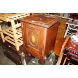 A small mahogany and inlaid cupboard