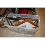 A box containing various pictures, prints and mirr