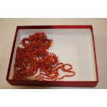 A box of branch coral necklaces etc.
