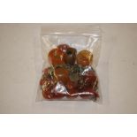 A quantity of amber coloured beads, jewellery etc.