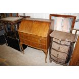 A walnut bureau fitted two long drawers