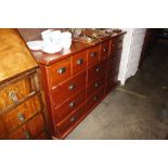 A pine multi drawer chest