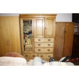 An Edwardian combination wardrobe fitted five drawers