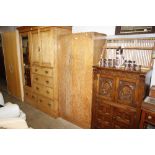 A limed oak two drawer wardrobe