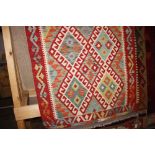 An approx. 4'2" x 2'9" Chobi Kelim rug