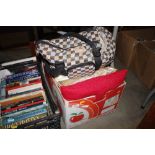 A box containing various cushions; a dog carrier e