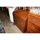 A Georgian mahogany bureau fitted three long drawe