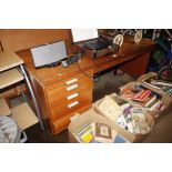 A desk fitted four drawers