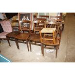 A set of four elm bar back chairs