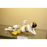 A porcelain "Bathing Beauty" doll in harem costume