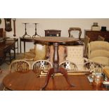 A 19th Century mahogany tripod occasional table wi