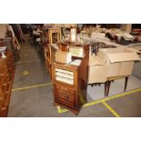 An Edwardian mahogany music cabinet with raised mi