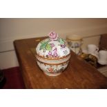 A Sampson porcelain bowl and cover having famille