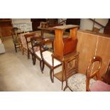 A pair of 19th Century mahogany sabre legged dining chairs; a mahogany bar back similar; a