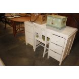 A white painted desk together with a white painted chair