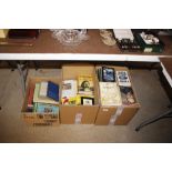 Four boxes of miscellaneous books