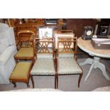 A set of four mahogany dining chairs in the Regenc