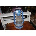 A hurricane lamp