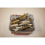 A box of various plated cutlery etc.
