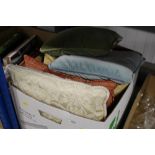 A box of miscellaneous cushions