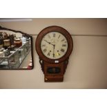 A Victorian walnut and inlaid cased wall clock by