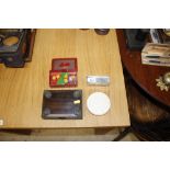 Three various Bakelite trinket boxes; and a glass