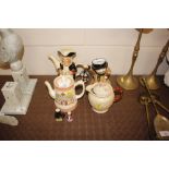 A Tony Wood novelty teapot; an Avonware jug; miniature Toby jugs etc.