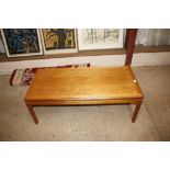 A teak oblong coffee table