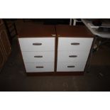 A pair of teak effect bedside chests fitted three drawers