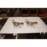 A pair of modern silver sauce boats in the early G