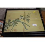 A set of four Chinese prints in black frames