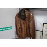 A vintage leather jacket and hat