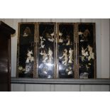 An oriental black lacquered and mother of pearl four fold table screen AF