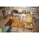 A set of four light Ercol stick back kitchen chair