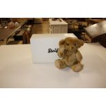 A small Steiff bear, boxed